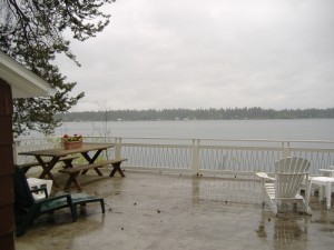 Come enjoy the beauty of the Northwest from the extra large furnished deck that sits right on Hayden Lake.